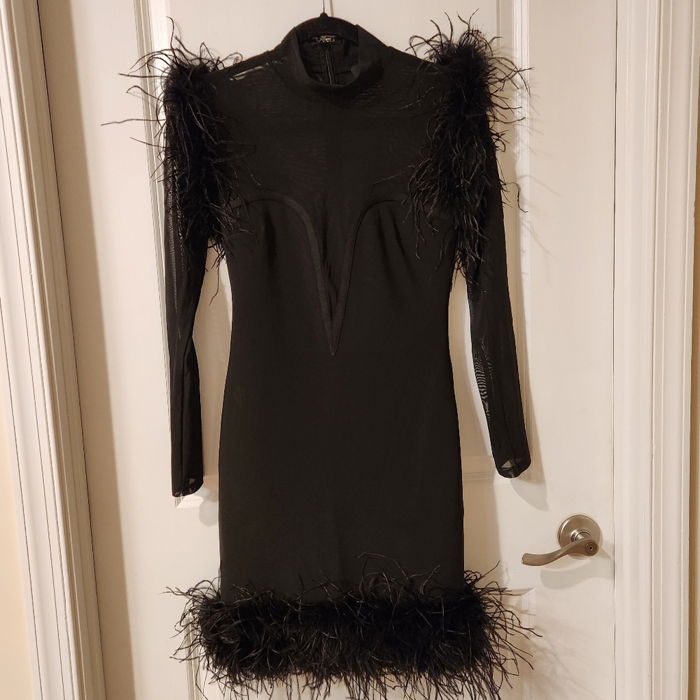 Akira new with tags bandage black dress Medium with feather bottom and sleeves